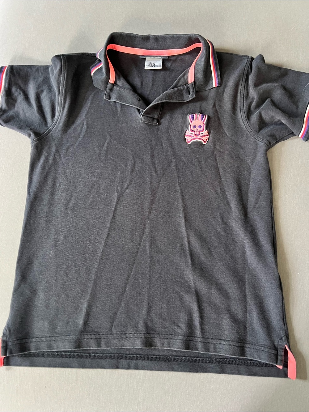 Psycho Bunny Black Polo with Pink Trim and Skull Patch